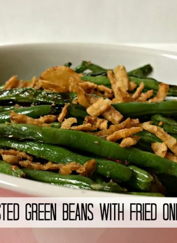 Roasting Green Beans with garlic and a bit of olive oil takes the vegetable to a whole new level and when topped with crunchy fried onions, they are the perfect side dish for any meal.