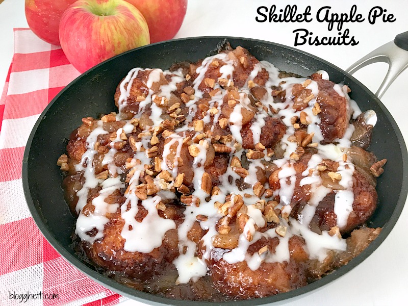 This Skillet Apple Pie Biscuit recipe will quickly become a family favorite. All of the flavors you love in apple pie but with biscuits and a sweet glaze on each and every one of the apple pie biscuits. 