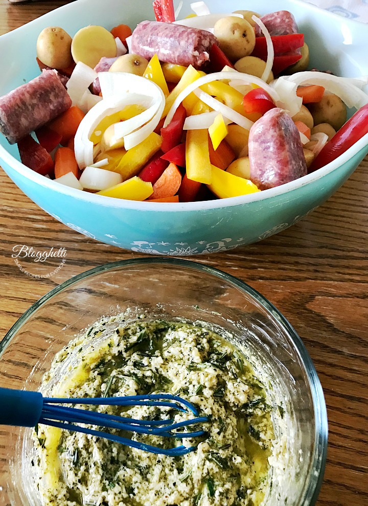 bowl with sausage and vegetables for sheet pan dinner