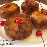 These Jumbo Upside-Down Pineapple Muffins are sweet and simple to make from scratch. Topped with a brown sugar glaze, pineapple ring, and a maraschino cherry they make the perfect sweet treat.