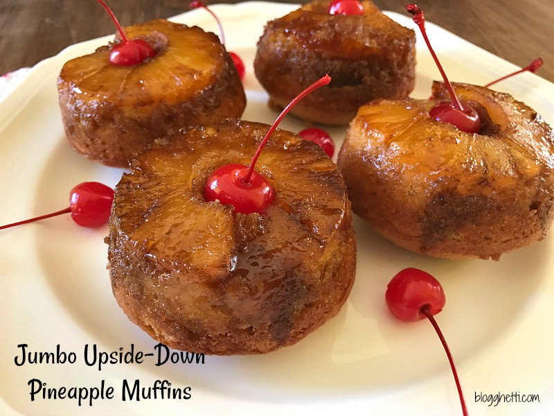 These Jumbo Upside-Down Pineapple Muffins are sweet and simple to make from scratch. Topped with a brown sugar glaze, pineapple ring, and a maraschino cherry they make the perfect sweet treat.