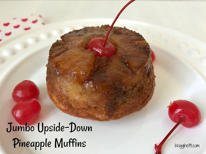 These Jumbo Upside-Down Pineapple Muffins are sweet and simple to make from scratch. Topped with a brown sugar glaze, pineapple ring, and a maraschino cherry they make the perfect sweet treat.