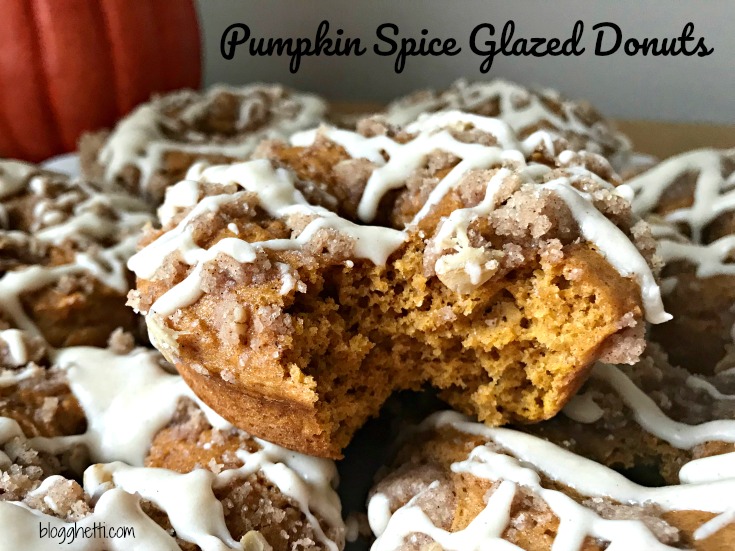 Pumpkin Spice Glazed Donuts from a simple boxed cake mix will make your family think you made them from scratch. The donuts are topped with a streusel and then drizzled with a maple glaze. 