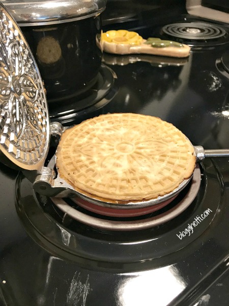 Classic Italian Pizzelles are delicate, thin, crisp, and wafer-like cookies. They are lightly sweet with plenty of the traditional anise flavor but vanilla pizzelles are just as delicious, if you're not a fan of anise.