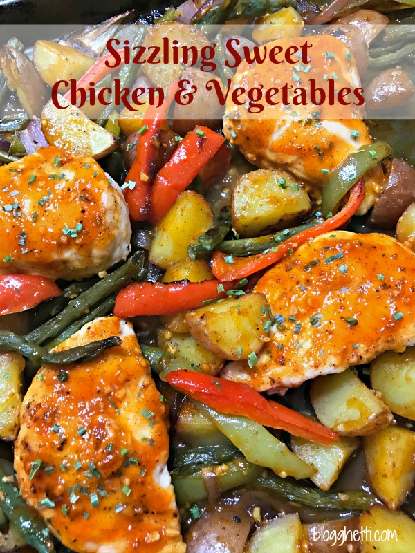 Sizzling sweet chicken and vegetables is a one-pan meal that isn't overly spicy but does have a kick.  It's a perfect weeknight meal and leftovers are great for lunch the next day. 