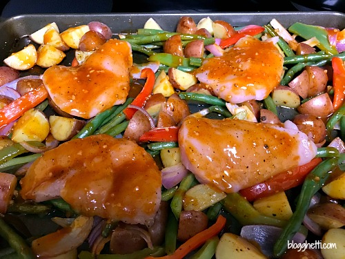 Sizzling sweet chicken and vegetables is a one-pan meal that isn't overly spicy but does have a kick.  It's a perfect weeknight meal and leftovers are great for lunch the next day. 