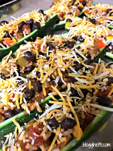 Zucchini burrito boats are so delicious and filling that you won't even notice that they're meatless. They are filled with your favorite salsa, black beans, and rice. 