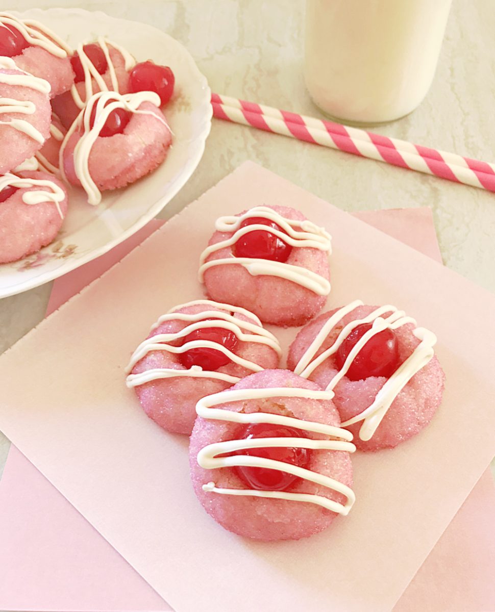 pink sugared cherry cookies on pink napkin