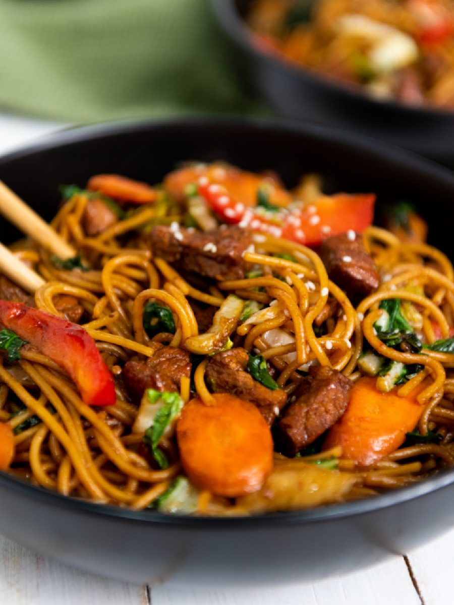 black bowl with pork lo mein made in the instant pot