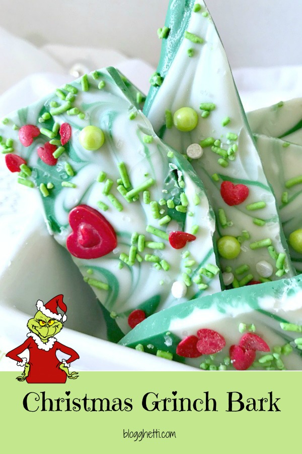 This sweet green and white chocolate candy Christmas bark will remind you of the Grinch, whose heart was two sizes too small. Perfect treat for gift giving or to satisfy a sweet tooth. #ChristmasSweetsWeek #ad #candy #grinch #candybark #srpinkles