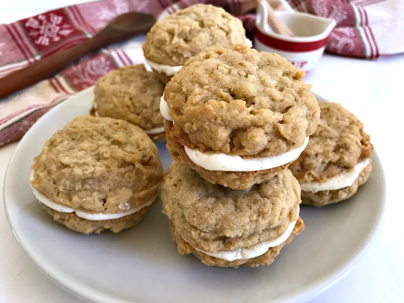 Oatmeal Maple Cream Pies are made with a maple cream filling sandwiched between two soft and chewy oatmeal cookies. #ChristmasSweetsWeek #cookies #oatmeal #maple #sponsored #baking