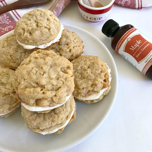 Oatmeal Maple Cream Pies are made with a maple cream filling sandwiched between two soft and chewy oatmeal cookies. #ChristmasSweetsWeek #cookies #oatmeal #maple #sponsored #baking