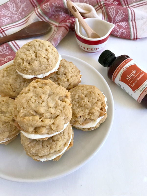 Oatmeal Maple Cream Pies are made with a maple cream filling sandwiched between two soft and chewy oatmeal cookies. #ChristmasSweetsWeek #cookies #oatmeal #maple #sponsored #baking