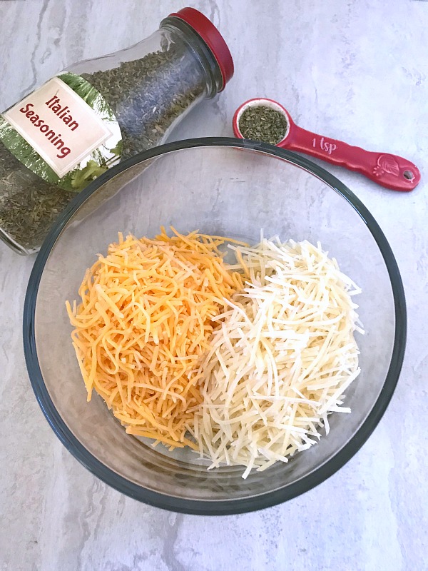 Baked Parmesan Cheddar Cheese Crisps are super easy to make and they are the perfect low-carb snack. Perfect for when snack cravings hit. #baked #cheese #crackers #nationalcheeseloversday