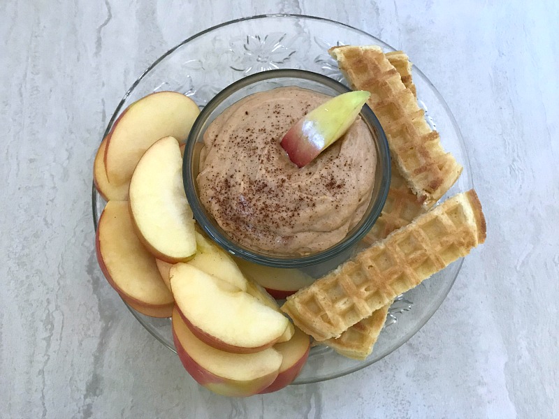 Cinnamon Peanut Butter Dip is simple to make and a delicious sweet treat for fruit and more. Simple ingredients that you probably already have in the pantry go into making this 5 minute dip. #peanutbutter #dip #fruit #nationalpeanutbutterday