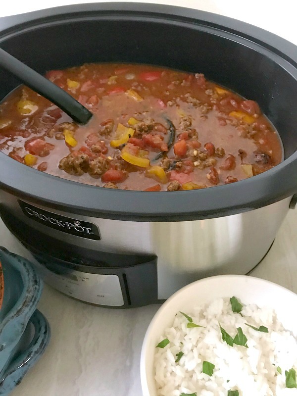 Slow Cooker Stuffed Pepper Soup is a hearty meal loaded with everything you love about a classic stuffed pepper - ground beef, rice and bell peppers, all in a tomato-based broth. #soup #stuffedpeppers #slowcooker #OurFamilyTable