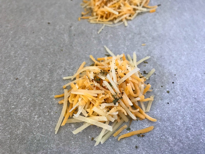 Baked Parmesan Cheddar Cheese Crisps are super easy to make and they are the perfect low-carb snack. Perfect for when snack cravings hit. #baked #cheese #crackers #nationalcheeseloversday