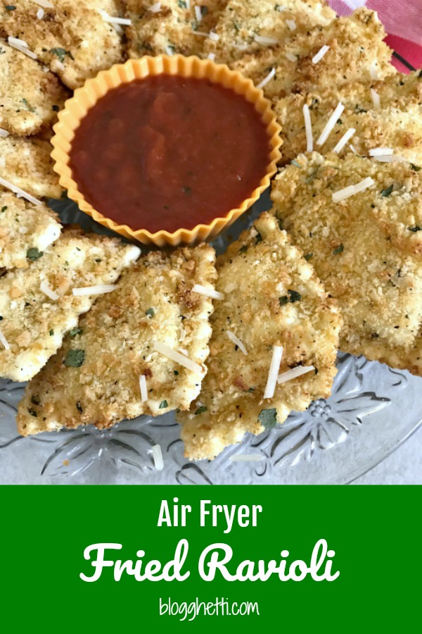 Air Fryer Fried Ravioli on a crystal plate with marinara dipping sauce.