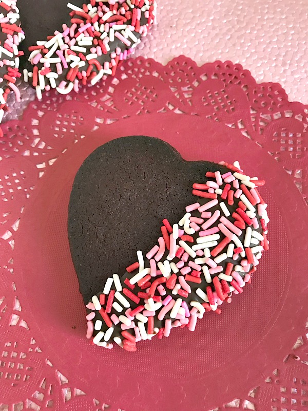If you love chocolate and sprinkles, then you will love these Sprinkled Chocolate Shortbread Heart Cookies. Perfect for Valentine's Day cookie trays. #cookies #chocolate #shortbread #ValentinesDay