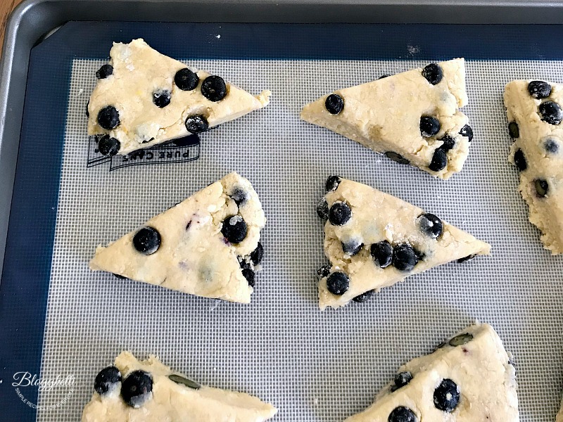 Cut lemon blueberry scones ready to bake