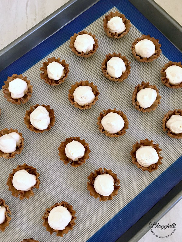 No Bake Mini Strawberry Cheesecake Cups - on sheet pan