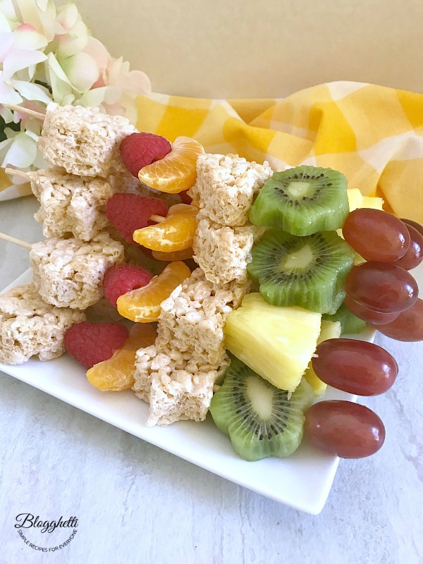 Fruit and Rice Krispies Treats Kabobs on white plate