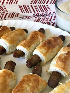 close up of sausage dippers with gravy - feature