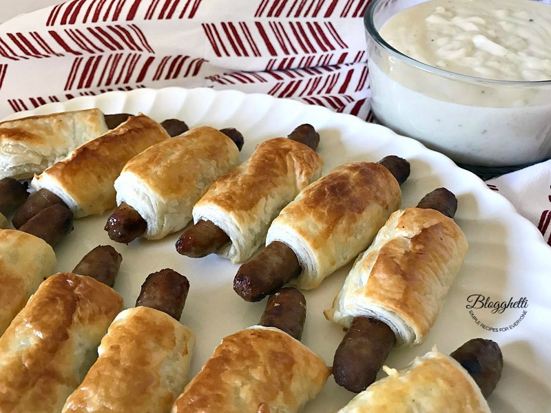 close up of sausage dippers with gravy - feature