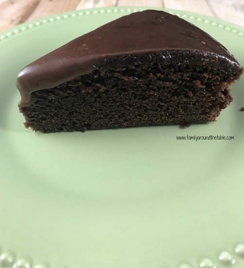 slice of double chocolate cake on a plate