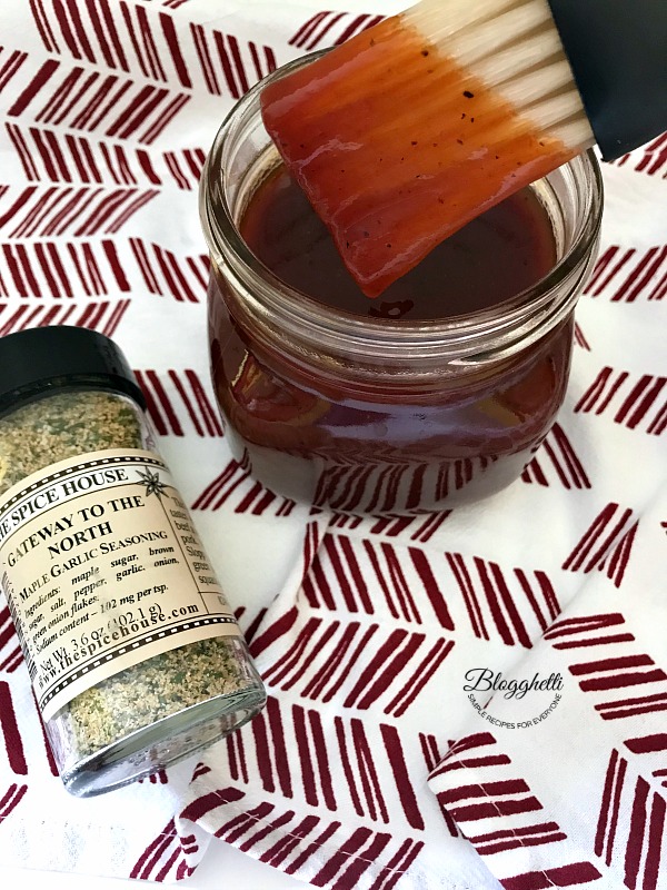 Cherry Bourbon BBQ Sause in jar with basting brush