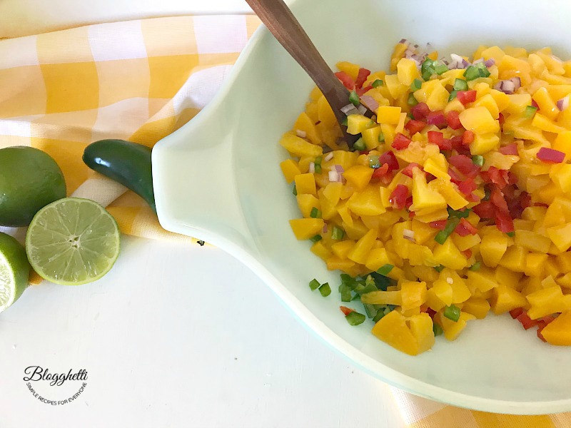 peach salsa ingredients in a Mixing bowl