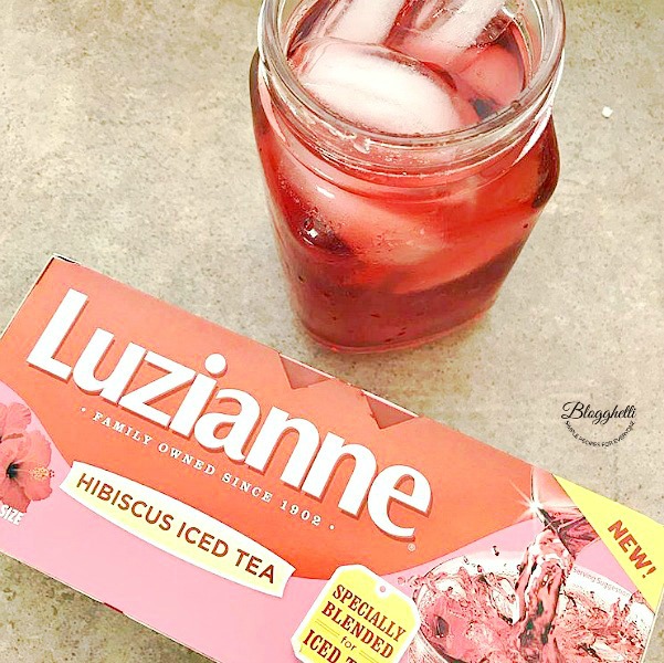 Luzianne Hibiscus tea with a glass of tea