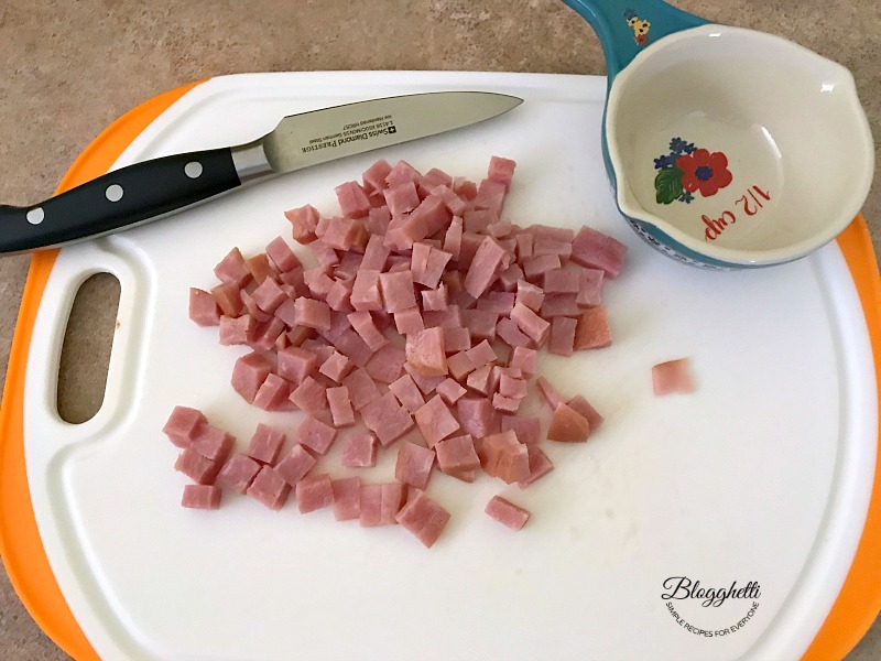 diced ham on cutting board