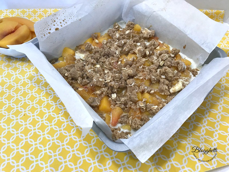 Peach Streusel Crumb Bars ready to be baked