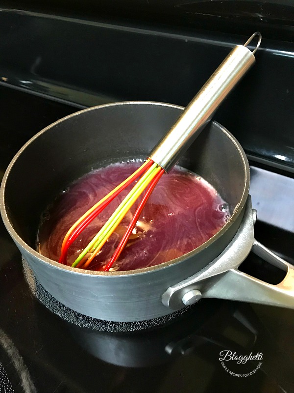 preparing the raspberry sauce