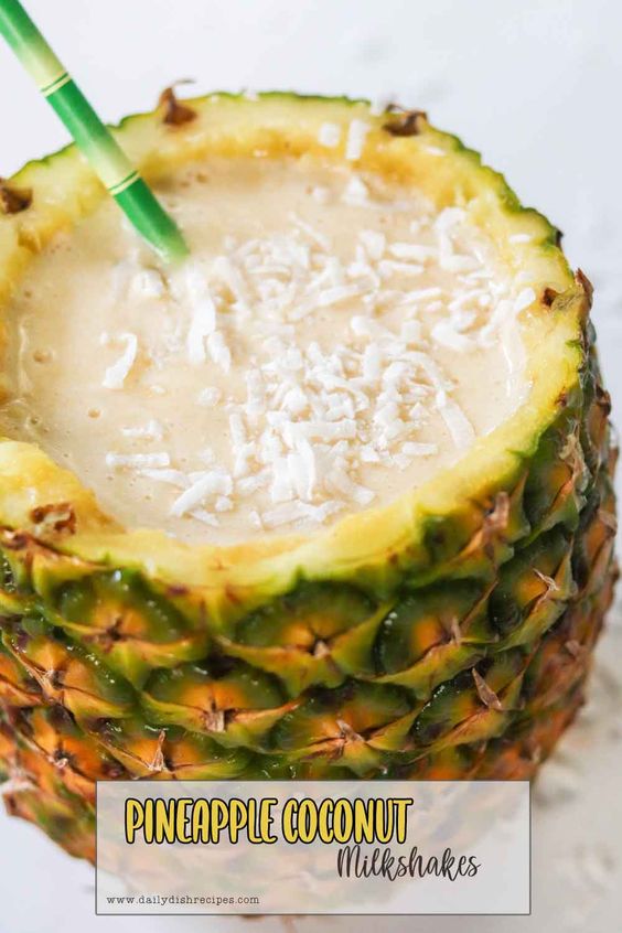 pineapple coconut milkshakes served in a pineapple shell