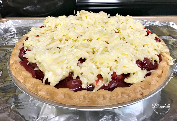 Macaroon Cherry Pie ready to bake in oven