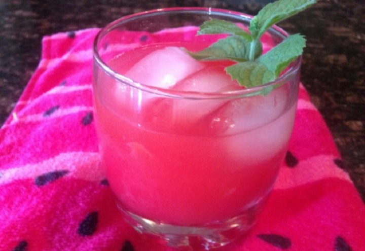 glass of Watermelon Lemonade with a sprig of mint