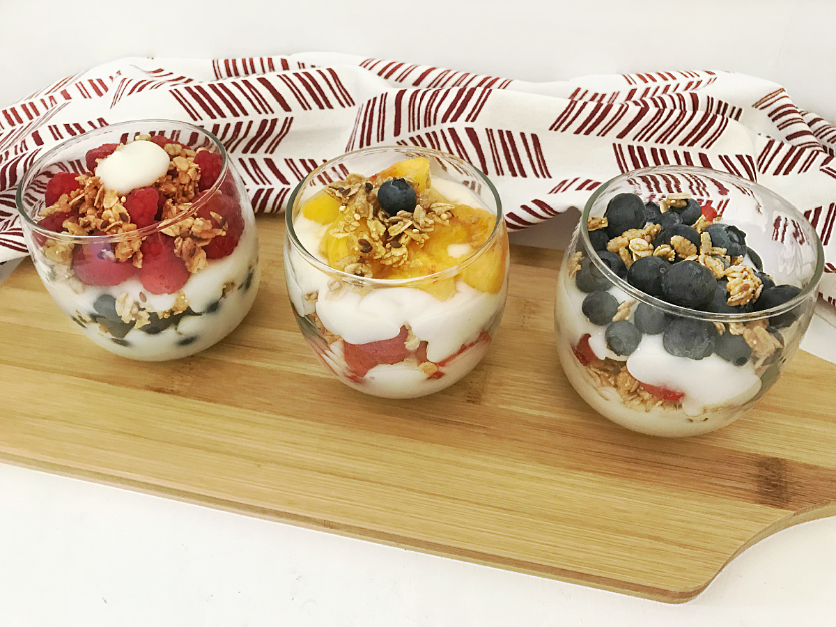 close up of fruit and yogurt in cups