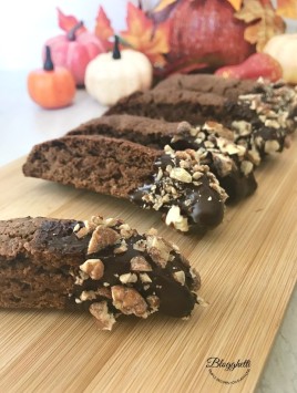 Cappuccino Biscotti with Pecans with fall pumpkins in the background