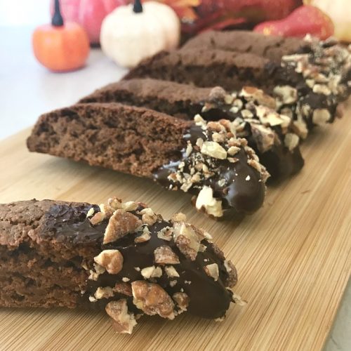 Cappuccino Biscotti with Pecans with fall pumpkins in the background