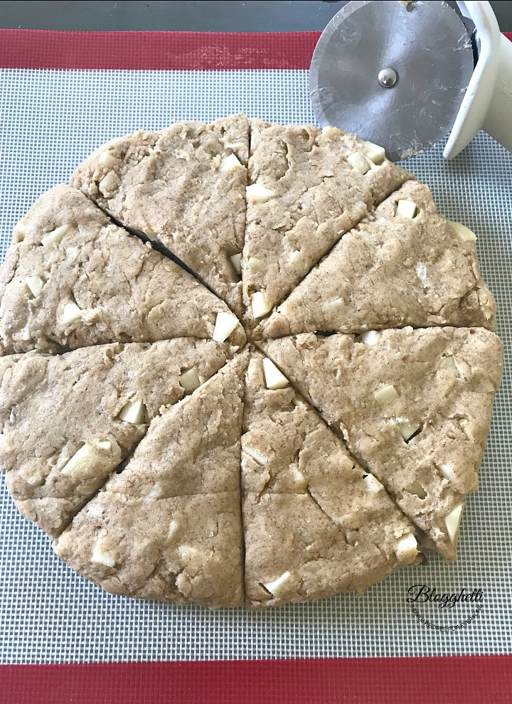 Caramel Apple Scone dough cut into 8 wedges ready to bake