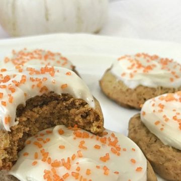 Close up of soft pumpkin cookies with cream cheese frosting