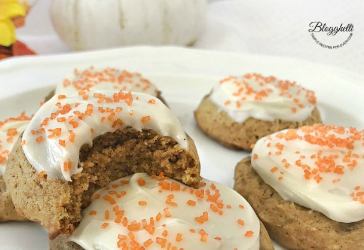 Close up of soft pumpkin cookies with cream cheese frosting