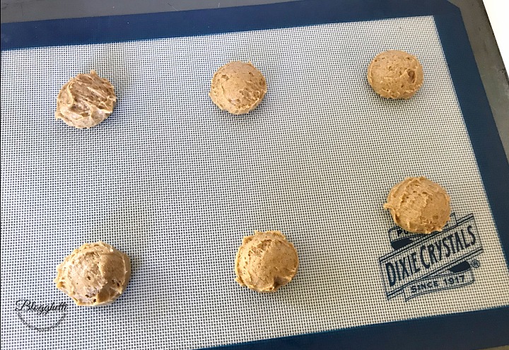 Pumpkin Cookie dough balls on sheet pan ready to bake