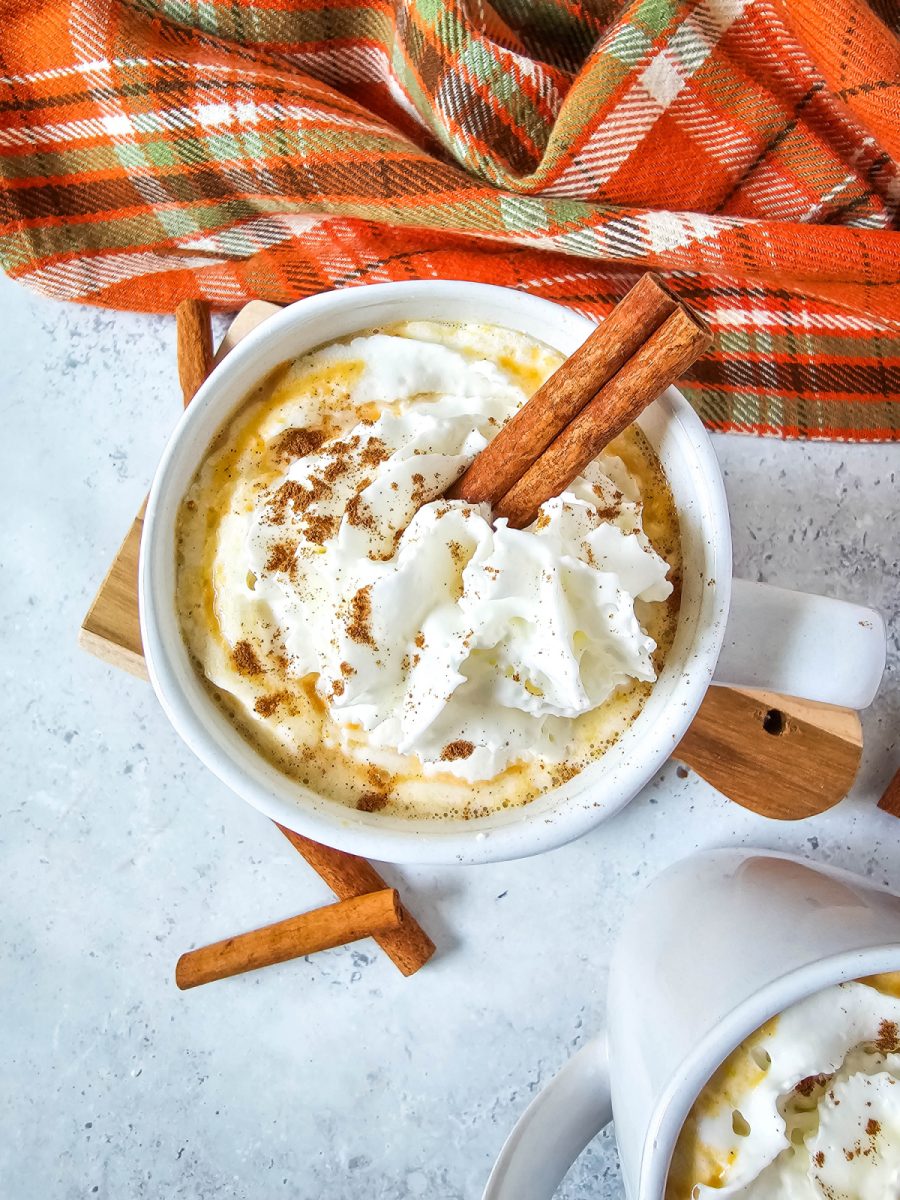 close up mug of hot cocoa with pumpkin spice