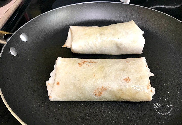 Preparing the wraps with southwestern filling