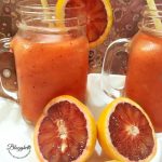 Blood Orange Strawberry Papaya Daiquiri with fruit in picture
