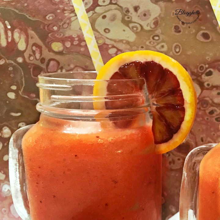 close up of Blood Orange Strawberry Papaya Daiquiri