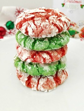 Christmas Crinkle Cookies stacked on white plate